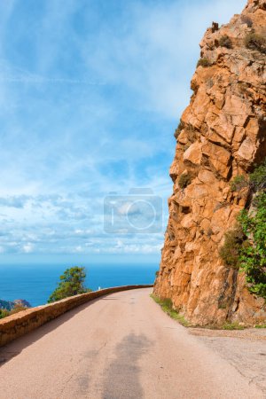 Photo for The winding roads which cross the magnificent creeks of Piana, a listed UNESCO World Heritage site in Corsica, France. - Royalty Free Image