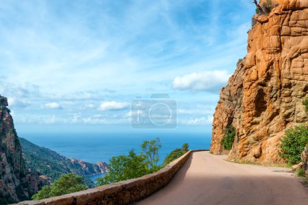 Photo for The winding roads which cross the magnificent creeks of Piana, a listed UNESCO World Heritage site in Corsica, France. - Royalty Free Image