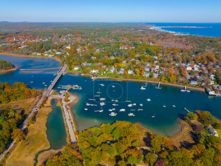 Photo for York River Bridge over York River aerial view in fall and Wiggly Bridge at Barrell Mill Pond Dam near the river mouth to the York Harbor, town of York, Maine ME, USA. - Royalty Free Image