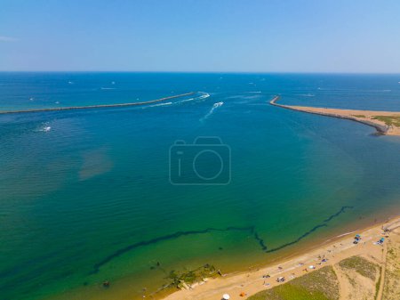 Photo for Merrimack River mouth to Atlantic Ocean aerial view between town of Salisbury and Plum Island in city of Newburyport, Massachusetts MA, USA. - Royalty Free Image