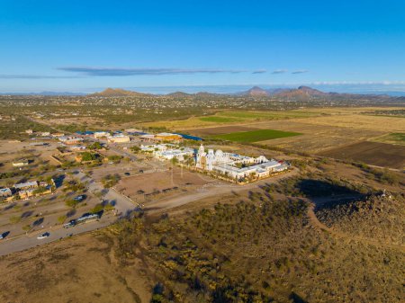 Foto de Mission San Xavier del Bac aerial view in Tohono O'odham Nation Indian Reservation near city of Tucson, Arizona AZ, USA. - Imagen libre de derechos