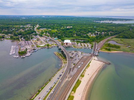 Photo for Niantic Beach Railroad Bridge aerial view in a cloudy day between Niantic River and Niantic Bay in village of Niantic, East Lyme, Connecticut CT, USA. - Royalty Free Image