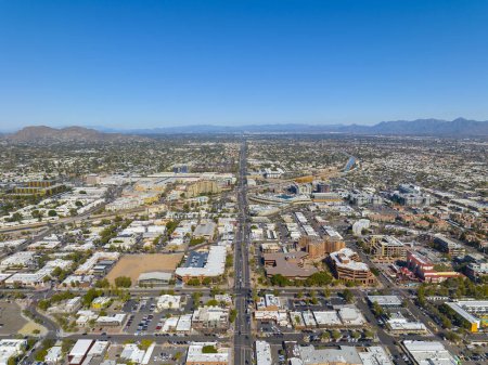 Foto de Scottsdale city center aerial view on Scottsdale Road at Main Street with Arizona Canal and Camelback Mountain at the background in city of Scottsdale, Arizona AZ, USA. - Imagen libre de derechos
