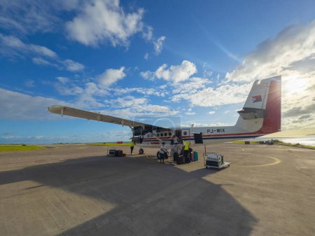 Photo for Winair DHC-6 at Juancho E. Yrausquin Airport SAB. SAB airport has the shortest commercial runway of the world in Saba, Caribbean Netherla - Royalty Free Image