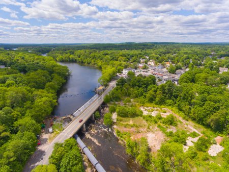 Nashua River and dam on the river at Pepperell historic town center aerial view in summer, town of Pepperell, Massachusetts MA, USA.