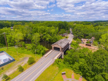 Pepperell Covered Bridge on Nashua River aerial view near Pepperell historic town center in summer, town of Pepperell, Massachusetts MA, USA.