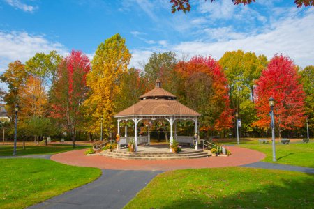 Bandstand at Bellingham Town Common in fall with maple trees at the background, historic town of Bellingham, Norfolk County, Massachusetts MA, USA. 
