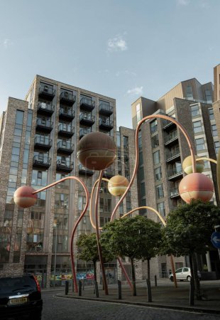 Photo for Liverpool, UK - Oct 09, 2023 - The penelope sculpture at Wolstenholme square's famous at Gradwell Street, Abstract of different coloured spheres at the end of poles twisting at different heights and directions, Merseyside, Copy space, Selective focus - Royalty Free Image
