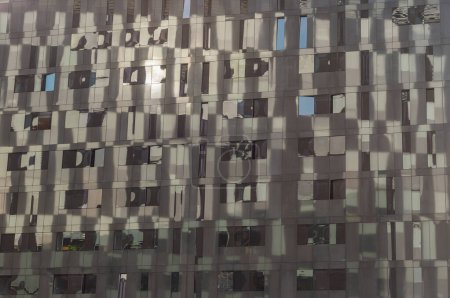 Photo for Liverpool, UK - Oct 07, 2023 - Sky reflection on Glass wall of Modern building with Repeating structure. Exterior architecture of building, Copy space, Selective focus. - Royalty Free Image