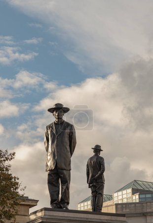 Photo for London, UK - Nov 01, 2023 - The sculpture recreates on the fourth plinth in Trafalgar Square of Malawian Baptist Preacher and Pan-Africanist John Chilembwe and European Missionary John Chorley. Space for text, Selective focus. - Royalty Free Image