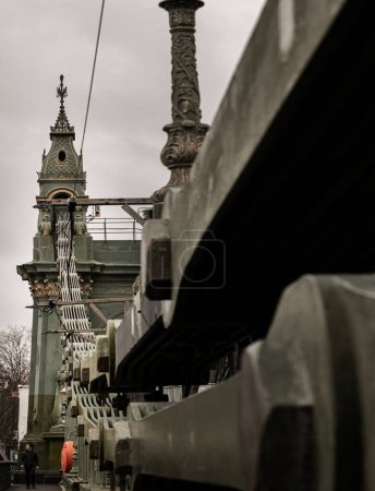 Photo for London, UK - Dec 25, 2023 - Design Architecture of Hammersmith Bridge. One of the world oldest suspension bridges and a major river crossing and primary route in west london, Space for text, Selective focus. - Royalty Free Image