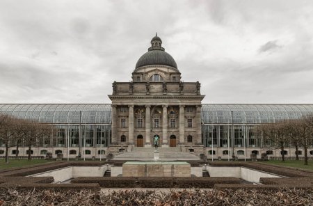 Munich, Germany - Dec 21, 2023 - Architecture exterior of Bayerische Staatskanzlei is a government building with Monument in front of entrance. Bavarian State Chancellery building (the former Bayerische Armeemuseum, Bavarian Army museum), Space for t