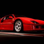 Maranello, Italy - April 01, 2023: luxury stylish Ferrari red supercar on dark background