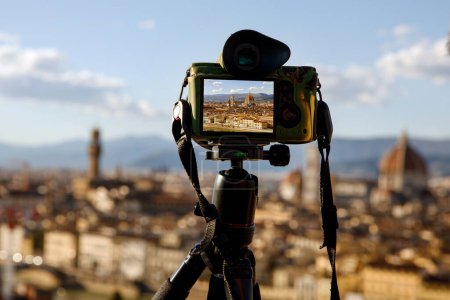 Photo for Travel photography: Taking photos of Florence, Italy using tripod and mirrorless camera - Royalty Free Image
