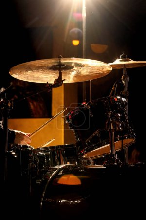 Photo for Percussionist performing on rock drum set with drumsticks - Royalty Free Image