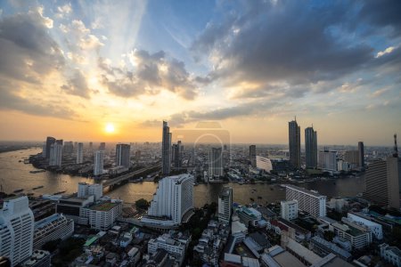 Photo for City view along the Chao Phraya River, capital, Bangkok Last sundown day of 2023, Thailand, December 31, 2023 - Royalty Free Image
