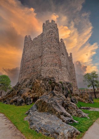 Photo for Sunset shot of Anadolu Hisari, or Anatolian Castle, a 13th century medieval Ottoman fortress built by Sultan Bayezid I, on the Anatolian side of the Bosporus in Beykoz district, Istanbul, Turkey - Royalty Free Image