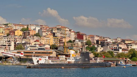 Photo for Istanbul, Turkey - September 1, 2022: View of Golden Horn, with S 338 submarine and Fenerbahce ferry boat, Halicioglu Neighborhood of Beyoglu district - Royalty Free Image