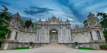 Evening shot of Gate at former Ottoman Dolmabahce Palace, or Dolmabahce Sarayi, suited in Ciragan Street, Besiktas district, Istanbul, Turkey. View from the internal court