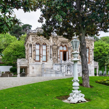 The elegant Ihlamur Pavilion, framed by manicured gardens and lush trees in Istanbuls Nisantasi district