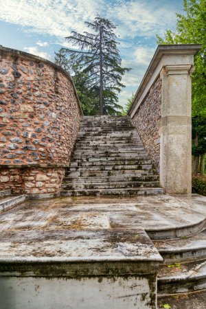 Stone staircase and weathered walls in the tranquil courtyard of the historic Beykoz Mecidiye Pavilion, Istanbul, Turkey