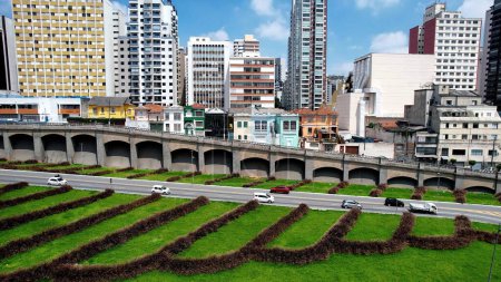 Photo for Panning wide of famous intersection between East Radial highway road and May 23 avenue at downtown Sao Paulo. East west link of regions of city. Transportation scenery. - Royalty Free Image