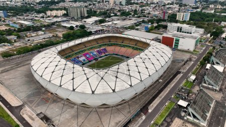 Photo for Panorama aerial view of Amazon Arena Soccer Stadium at downtown city Manaus Brazil. Cityscape of tourism landmark city. Sports Center Amazon Arena at downtown Manaus Brazil. - Royalty Free Image
