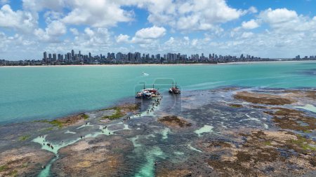 Photo for Natural Pools At Joao Pessoa In Paraiba Brazil. Seascape Landscape. Coast Coral Reef. Nature Boat. Snorkeling Background. Natural Pools At Joao Pessoa Paraiba Brazil. - Royalty Free Image