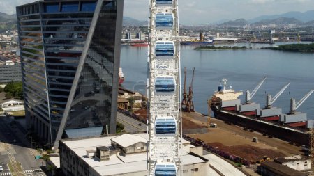 Photo for Panoramic aerial view of Ferris Wheel at Amusement Park in Rio de Janeiro Brazil.  International travel landmark. Vacation destination - Royalty Free Image