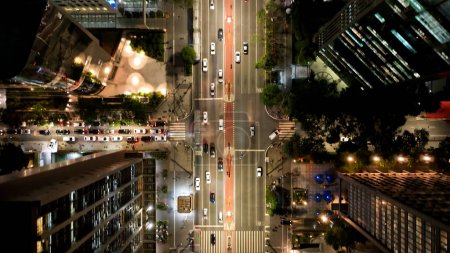 Photo for Sao Paulo Brazil. Top view night Paulista Avenue at downtown Sao Paulo Brazil. Transportation scenery. Business office buildings. Vehicles on Avenue. Cityscape Paulista Avenue at Sao Paulo Brazil. - Royalty Free Image