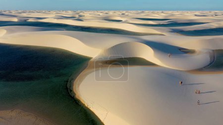 Photo for Sand dunes and rain water lagoons at northeast brazilian paradise. World travel destinations. Tropical scenery. Lencois Maranhenses Maranhao Brazil. - Royalty Free Image