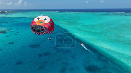Photo for Parasail At San Andres Providencia Y Santa Catalina Colombia. Aquatic Sports. Beach Landscape. San Andres At Providencia Y Santa Catalina Colombia. Tourism Background. Nature Seascape. - Royalty Free Image