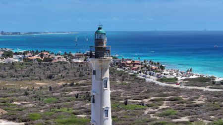 California Lighthouse At Oranjestad In Caribbean Netherlands Aruba. Beach Landscape. Caribbean Paradise. Oranjestad At Caribbean Netherlands Aruba. Seascape Outdoor. Nature Tourism.