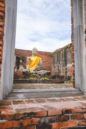 Photo for Beautiful scenery in Wat Lokayasutharam, Ayutthaya, Thailand. One site of Ayutthaya Unesco World Heritage Site. - Royalty Free Image