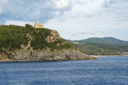 Photo for Castle on the cliff by The Ligurian Sea. Sonnino Castle in Quercianella, Tuscany, Italy - Royalty Free Image