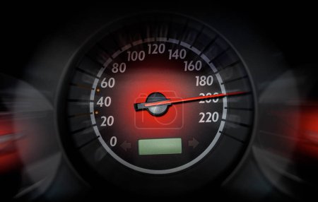 Photo for The speedometer of a modern car shows a high driving speed. Added motion blur. - Royalty Free Image