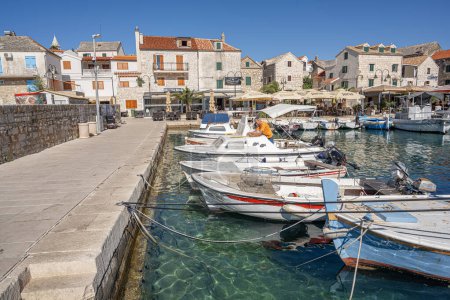 Photo for Primosten, Croatia - July 27, 2023: Fishing boats in Primosten old town port, Dalmatia, Croatia - Royalty Free Image