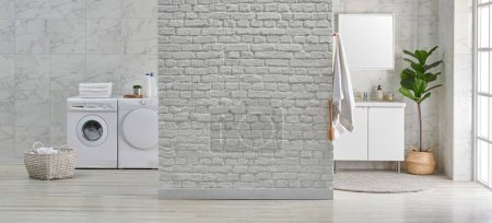 Foto de Cuarto de baño blanco estilo interior de la pared de cerámica con espejo lavabo y lavadora estilo, gabinete de pared de ladrillo y decoración de accesorios para el hogar, material de limpieza. - Imagen libre de derechos