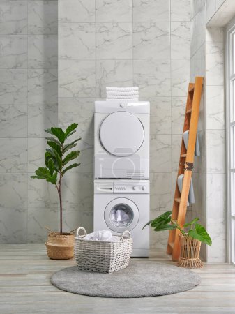 Téléchargez les photos : Machine à laver et à sécher en rangée, style salle de bain décorative, concept d'angle. - en image libre de droit