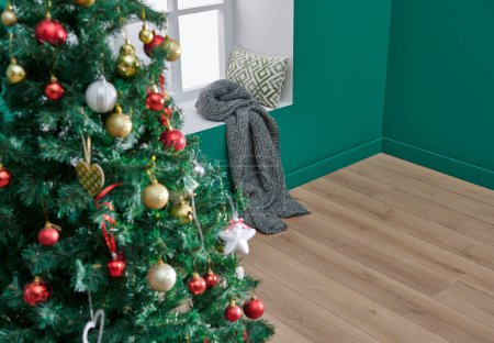 Photo for Green corner room style, close up Christmas and new year tree, ornament, accessory, windows, blanket and wooden chair style. - Royalty Free Image