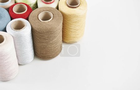 Foto de Yarn rope and fabric white background isolated style. - Imagen libre de derechos