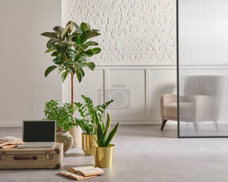 Téléchargez les photos : Modern home furniture design, gold vase of plant, retro old baggage and laptop style, white brick and classic wall background frame and armchair. - en image libre de droit
