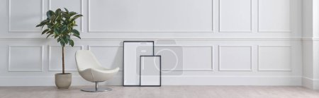 Photo for White classic wall background, brown parquet floor, home furniture detail, frame and vase of plant. - Royalty Free Image