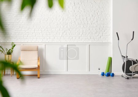 Photo for Rocker chair in the white room, brick and classic wall background, chamber, green plant leaf close up blur, working table. - Royalty Free Image