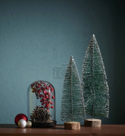 Photo for Christmas and new year accessory on the table and green background, cone, tree, frame. - Royalty Free Image