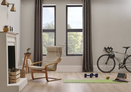 Téléchargez les photos : Sport dans le concept de la maison avec vélo et tapis, chaise murale et style intérieur de la chambre. - en image libre de droit