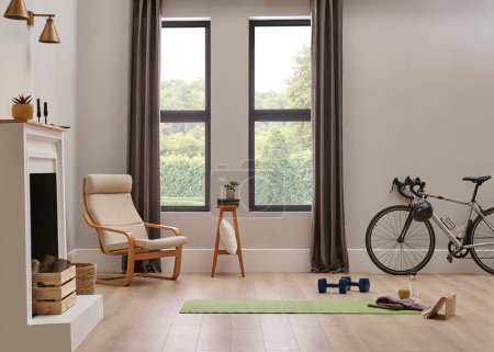Téléchargez les photos : Sport dans le concept de la maison avec vélo et tapis, chaise murale et style intérieur de la chambre. - en image libre de droit