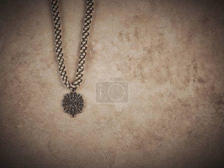 Foto de Elegant jewelry set ring, necklace and earrings with diamonds.Product still life concept. Modern and decorative textured background. - Imagen libre de derechos