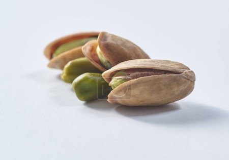 Photo for Delicious nuts and peanut on the background, close up style, in the plate still life. - Royalty Free Image