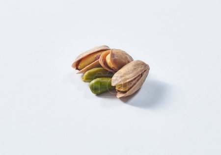 Photo for Delicious nuts and peanut on the background, close up style, in the plate still life. - Royalty Free Image